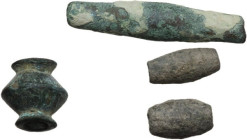 Roman to Medieval period. Lot of four (4) bronze beads and spindles. Various shapes and dimensions.