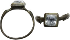 Medieval period. Bronze ring with transparent square gem. 21.00 mm size.