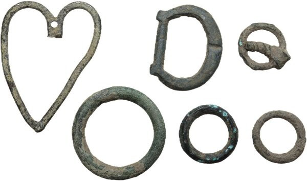 Miscellanea. Lot of six (6) various bronze items, including three rings and part...