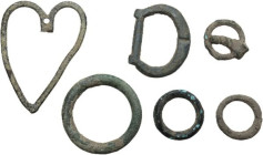 Miscellanea. Lot of six (6) various bronze items, including three rings and part of a brooch.