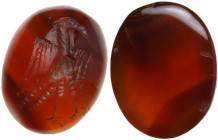 Antique style. Carnelian engraved with a representation of a bird facing right, in Sasanian style. 16 x 13 mm.