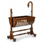 Kinderwiege im Empire-Stil, Frankreich, 19./20. Jh.

Mahagoni. Verstrebter Unterbau. Eine der Seitenstützen mit Schwanenhals. 146 x 106 x 52 cm
