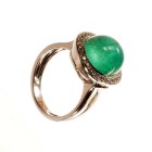 *
Eleganter Smaragd-Brillant-Ring 18K WG

Schauseite im Zentrum besetzt mit 1 grösseren, ovalen Smaragd-Cabochon mit feinen Oberflächenmerkmalen von c...