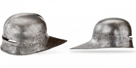 *
Schaller, deutsch, 2. Hälfte 15. Jh.

Z 2

Einteilig geschlagene Glocke mit flach ausgetriebenem Mittelkamm, lang ausgezogenem Nackenschirm und Bohr...
