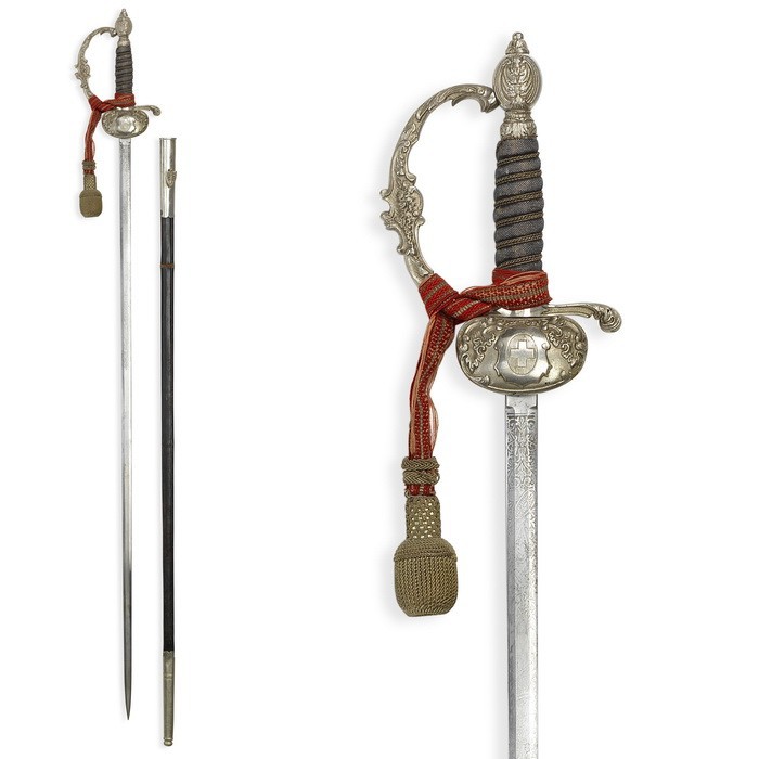 Feldpredigerdegen, eidg. Ord. 1911, erste Serie

Z 2
L 97,5 cm

Klinge sig. "SCH...