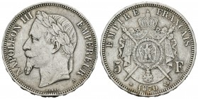 Francia. Napoleón III. 5 francos. 1870. París. A. (Km-799.1). (Gad-739). Ag. 24,79 g. Limpiada y golpe en el canto. MBC. Est...25,00.