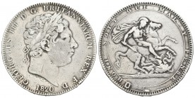 Gran Bretaña. George III. 1 corona. 1820. (Km-675). Ag. 28,02 g. LX en el canto. BC+. Est...60,00.