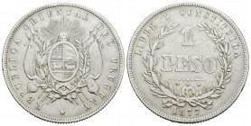 Uruguay. 1 peso. 1877. A. (Km-17). Ag. 24,74 g. Limpiada. Escasa. MBC-. Est...35,00.
