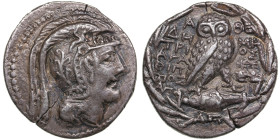 Attica, Athens AR Tetradrachm 166-57 BC
15.57g. 31mm. VF+/XF. Obv. Head of Athena Parthenos right, wearing triple-crested Athenian helmet. / Rev. Owl ...