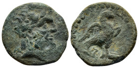 Lydia, Tralleis(?), c. 2nd-1st century BC. Æ (22mm, 5.6g). Laureate head of Zeus r. R/ Eagle standing r. on thunderbolt, wings spread; c/m: griffin fl...