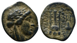 SELEUKID KINGDOM. Antiochos II Theos (261-246 BC). Ae. (18mm, 3.4 g) Sardes. Obv: Laureate head of Apollo right. Rev: ΒΑΣΙΛΕΩΣ ΑΝΤΙΟΧΟΥ. Tripod. Contr...