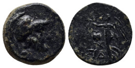 PAMPHYLIA. Side. 3rd to 1st centuries B.C. Æ. (15mm, 4.0 g). Head of Athena right in a Corinthian helmet. / Nike advancing left holding a wreath and a...
