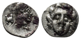 Pisidia, Selge. AR Obol. (10mm, 0.5 g) 3rd Century BC. Helmeted head of Athena right, astragal behind. / Facing head of Gorgoneion.