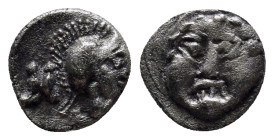 Pisidia, Selge. AR Obol. (9mm, 0.9 g) 3rd Century BC. Helmeted head of Athena right, astragal behind. / Facing head of Gorgoneion.