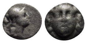 Pisidia, Selge. AR Obol. (9mm, 0.6 g) 3rd Century BC. Helmeted head of Athena right, astragal behind. / Facing head of Gorgoneion.