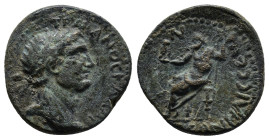 PHRYGIA. Prymnessus. Trajan. AD 98-117. Ae. (18mm, 4.9 g) Obv: Laureate head right. Rev: ΠΡVΜΝΗСCЄΩΝ. Zeus seated left on throne, holding Nike and sce...