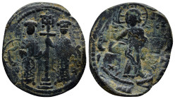 Constantine X Ducas. 1059-1067. AE follis (29mm, 6.5 g). overstruck on anonymous follis, Class D. Constantinople mint. / + KωN T ΔK ЄVΔK AVΓO (or simi...