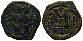 Justin II. 565-578. Æ Follis (30mm, 13.3 g). Nicomedia mint. Dated RY 6 (570/1). Justin and Sophia, both nimbate, enthroned facing; Justin holding glo...