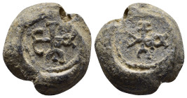 BYZANTINE LEAD SEALS. (21mm, 13.3 g). Obv: Cruciform monogram. Rev: Cruciform monogram.