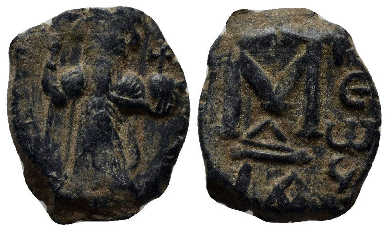 Arab-Byzantine, c. 660s-680s. Æ Fals (21mm, 4.4 g), Emperor standing facing, hol...