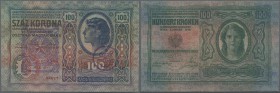 Austria: FIUME 100 Korona 1912 P. S115d withh large stamp ovpt. at left and additional round stamp at lower right, seldom seen, used note, folds, cond...
