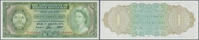 British Honduras: 1 Dollar 1973 P. 28c, S/N G/6 950689, portrait QEII, crisp original paper, original colors, only two very light bends in paper, cond...