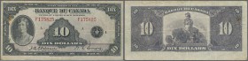 Canada: Banque du Canada 10 Dollars 1935, P.45, highly rare banknote with 2 rusty pinholes at left, lightly toned paper and a few folds. Condition: F