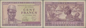 Guinea: 100 Francs 1958 P. 7, center fold, light horizontal fold, very crisp original paper, original colors, no holes or tears, condition: VF to VF+.