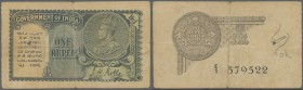 India: 1 Rupee ND P. 14, KGV portrait, used with stronger center fold, hole at left and stained paper, condition: F- to F.