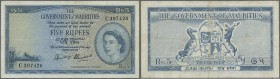 Mauritius: 5 Rupees ND(1954) P. 27, used with some light folds and creases, no holes or tears, stron paper, not washed or pressed, original colors, co...