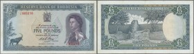 Rhodesia: 5 Pounds 01.07.1966 P. 29, portrait QEII, used with light folds in paper, no holes or tears, pretty crisp paper and original colors, no repa...