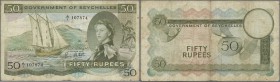 Seychelles: 50 Rupees October 1st 1970 with signature: Bruce Greatbatch, P.17c, another lovely ”Sex”-note with handling traces like a few folds and li...