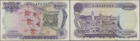 Singapore: 1000 Dollars ND(1967-75) replacement note with series ”Z” and serial 005000, P.8dr. highly rare note in still nice condition with a few fol...