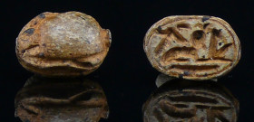 Egypte - Basse époque - Scarabée en pierre (animal couché) - 633-332 av. J.-C. - (26-30ème dynastie)
Scarabée en pierre beige dont l'empreinte représ...