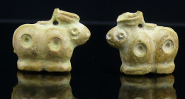 Proche Orient - Cachet en pierre (mouton) - 800 / 500 av. J.-C.
Beau cachet pendentif en pierre beige représentant un mouton portant un récipient sur...