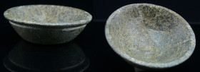 Iran - Coupe en chlorite - 1500 / 800 av. J.-C.
Coupelle en chlorite ornée de ciselures sur le bord et d'une autre ciselure sur le pourtour extérieur...