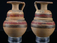 Grèce - Alabastron étrusco-corinthien - 500 / 400 av. J.-C.
Alabastron en forme de poire sans aucune trace de restauration. Décor géométrique d'une t...