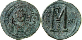 BYZANZ. 
IUSTINIANUS I. 527-565. AE-Follis 39mm ("12"= 538/539) 22,25g, Konstantinopel. Behelmte Büste mit Kreuzglobus v. vorn DN IVSTINIANVS PP AVG ...