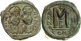 BYZANZ. 
IUSTINUS II. 565-578. AE-Follis 27/28mm ("2"= 566/567) 16,36g, Konstantinopel, 2. Off. Kaiserpaar thront v.v. D N IVSTI-NVS PP AVI / Wert M ...