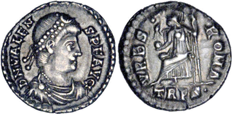 VALENS (364-378)
Silique : Rome assise à gauche sur un trône, tenant une Victoi...