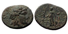 Aeolis, Temnos. Ae,(Bronze, 3.78 g 20mm), 2nd-1st centuries BC.
Obv: Wreathed head of Dionysos right.
Rev: Δ - H / T - A./ Athena standing left with N...