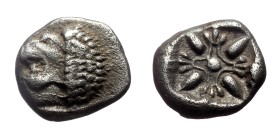 Ionia, Miletos, AR Obol or Hemihekte,(Silver, 1.16 g 9mm), Late 6th-early 5th centuries BC.
Obv: Forepart of lion right, head left.
Rev: Stellate fl...