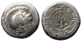 Ionia, Magnesia ad Maeandrum. AR Obol,(Silver, 0.78 g 9mm), 350-190 BC. 
Obv: Helmeted head of Athena 
Rev: Trident within meander pattern, MA. 
Ref: ...