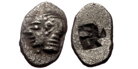 Ionia, Kolophon, AR Tetartemorion,(Silver, 0.20 g 7mm), Late 6th century BC.
Obv: Archaic head of Apollo left.
Rev: Quadripartite incuse square.
Re...