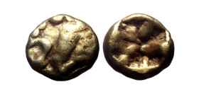 Ionia, Uncertain mint EL Hemihekte. Circa 625-600 BC. Milesian standard. Geometric type.
Uncertain design, possibly a wheel of four spokes / Rough inc...