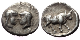 Caria, Uncertain, AR Hemiobol, (Silver, 0.40 g 7 mm), 420-350 BC. 
Obv: Bare female and male (or female) heads facing one another
Rev: Bull standing r...
