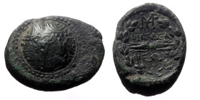 Lydia, Philadelphia, AE,(Bronze,5.40 g 20mm), 2nd-1st centuries BC. 
Obv: Macedonian shield.
Rev: ΦΙΛΑΔΕΛ / ΦΕΩΝ. Thunderbolt diving legend; monogram ...