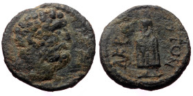 Lydia. Acrasus. Pseudo-autonomous. AE. (Bronze, 1.74 g. 13 mm.) Time of Septimius Severus and Caracalla, c. 193-217 AD.
Obv Head of Herakles, right, w...