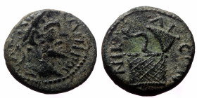 Bithynia, Nicaea. Septimius Severus. AE. (Bronze, 2.71 g. 14mm.) 193-211 AD.
Obv: Legend illegible. Laureate head of Septimius Severus, right.
Rev: NI...