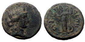 Phrygia, Synnada. Pseudo-autonomous. AE. (Bronze, 3.36 g. 18mm.) Late first or early second century? AD.
Obv: Turreted head of Tyche, right.
Rev: ⳞΥΝΝ...